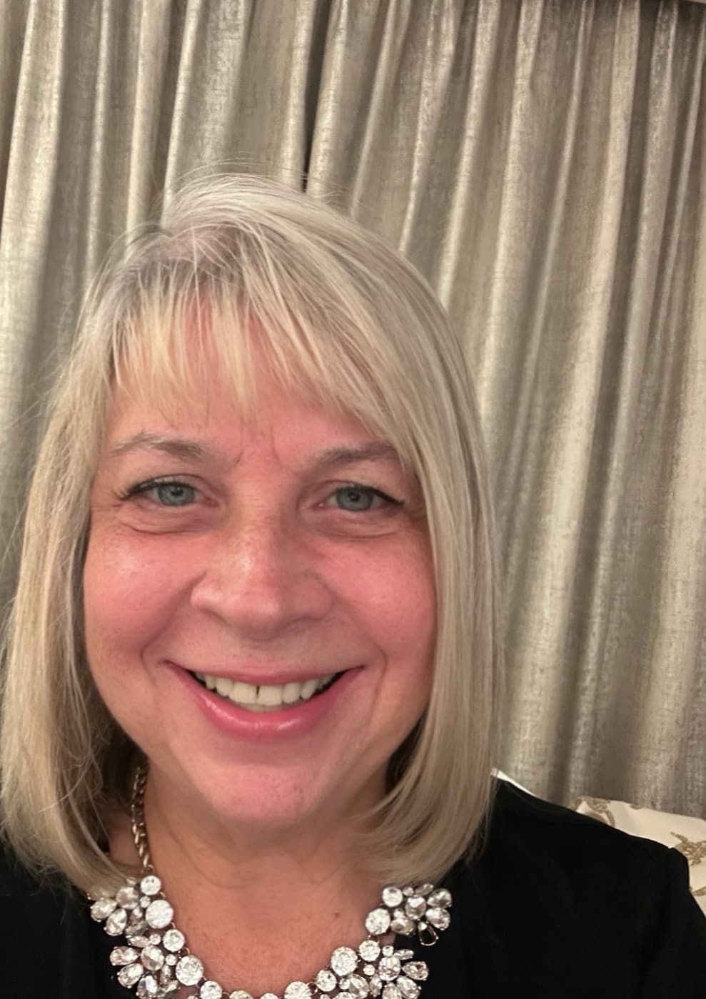 Denise Owen-Fabricius smiling, psychiatric nurse practitioner